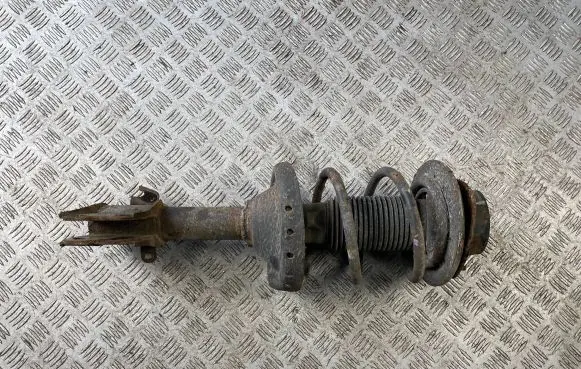 Subaru Legacy Front shock absorber with coil spring
