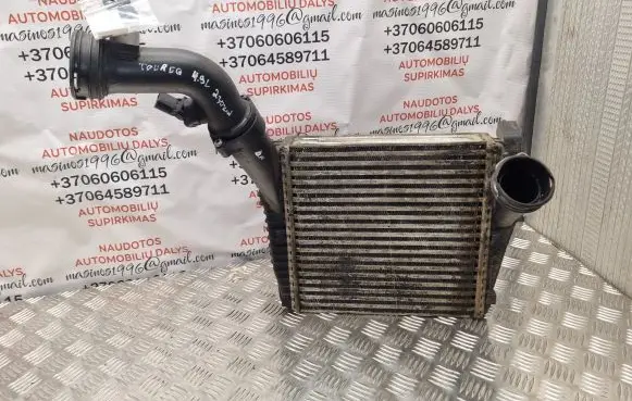 Volkswagen Touareg I Intercooler radiator 7L0145803A