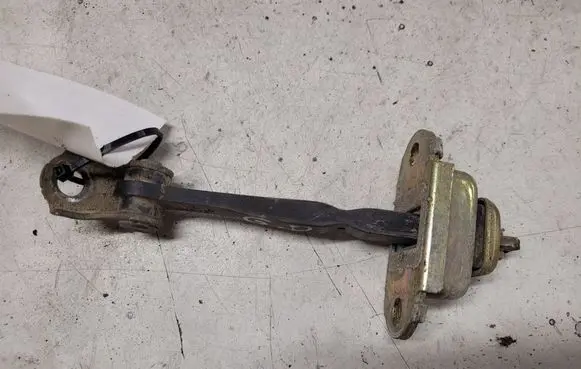 Nissan Primera Rear door check strap stopper