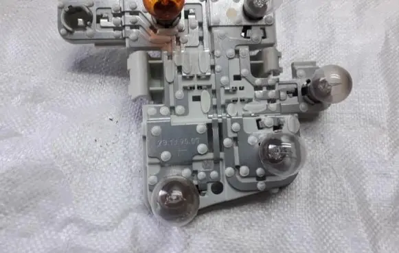 Volvo S40, V40 Tail light bulb cover holder