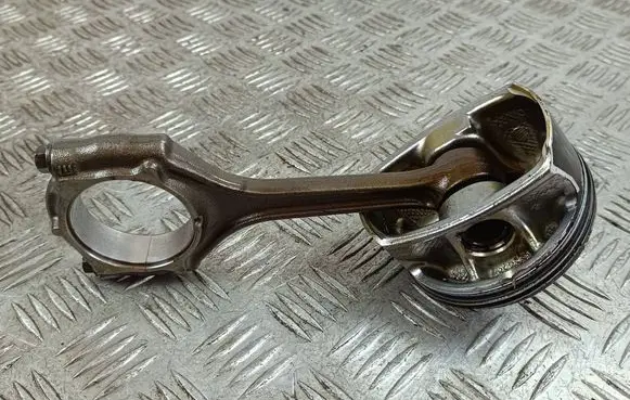 Piston with connecting rod