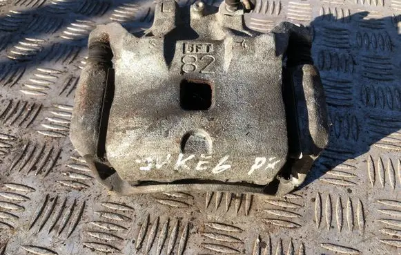Nissan Juke I F15 Front brake caliper
