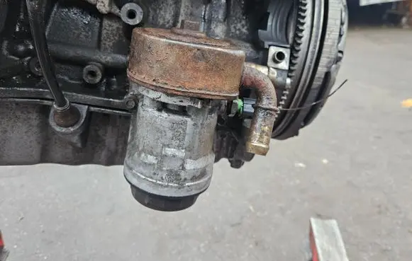 Mazda CX-7 Oil filter mounting bracket 1S7G6884AE