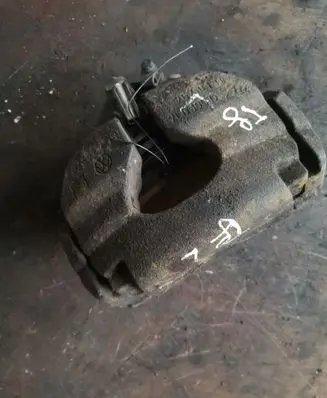 Volkswagen Touareg I Front brake caliper
