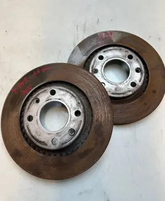 Peugeot 208 Front brake disc 9865746354
