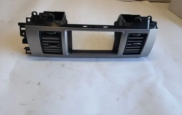 Jaguar XF Dash center air vent grill CX2319K617AA CX23045C34AA