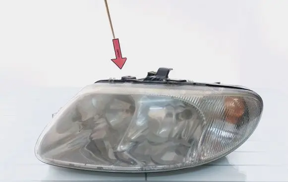 Chrysler Grand Voyager IV Headlight/headlamp 5870100000 04857703ABF