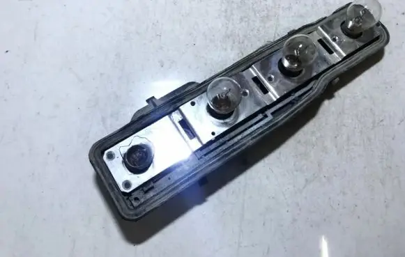 Opel Astra G Tail light bulb cover holder