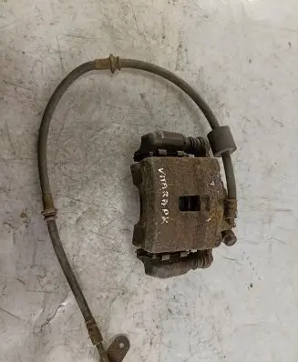 Suzuki Grand Vitara I Front brake caliper