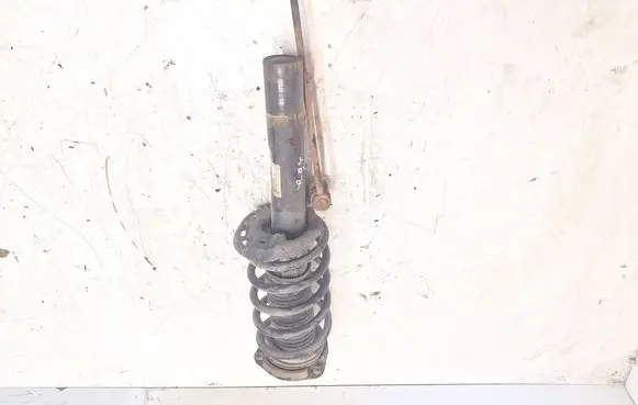 Volkswagen Caddy Front shock absorber with coil spring