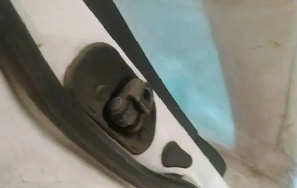 Rear door check strap stopper