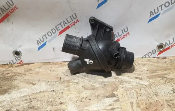 Thermostat/thermostat housing