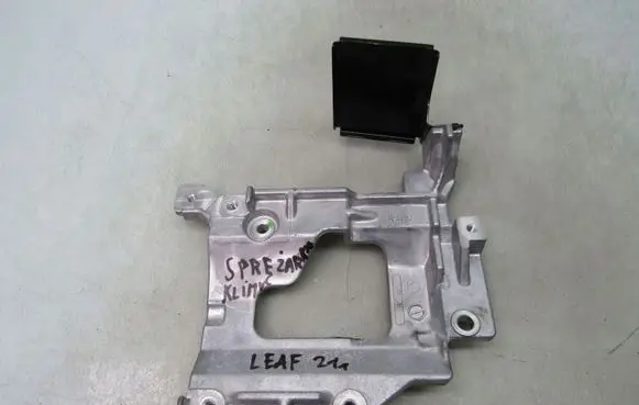 Nissan Leaf II (ZE1) A/C compressor mount bracket 201225B009