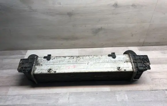 BMW 3 E90 E91 Intercooler radiator 7798788 3296399