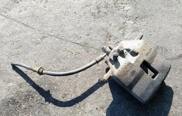 Nissan Almera Tino Front brake caliper