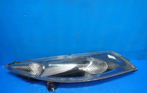 Nissan Juke I F15 Headlight/headlamp