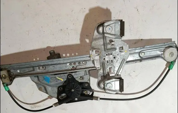 Cadillac DeVille Front door window regulator with motor