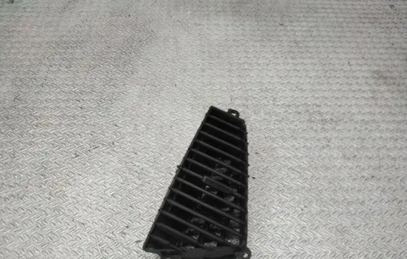 KIA Carens II Dash center air vent grill