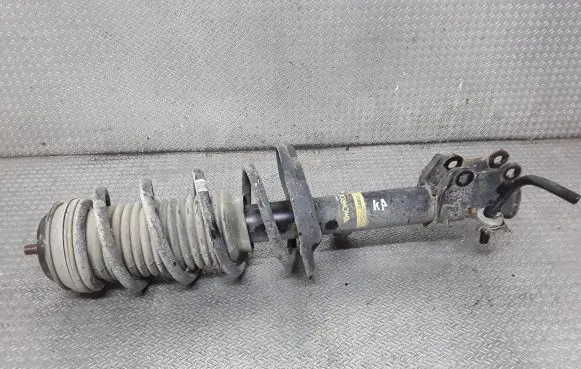 Opel Corsa D Front shock absorber with coil spring