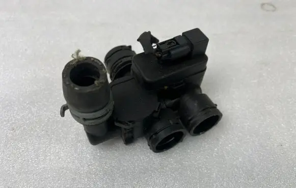 Coolant heater control valve