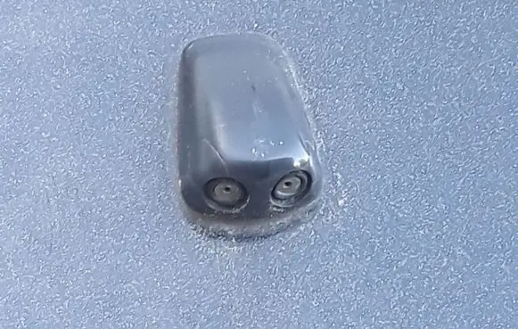 Windshield washer spray nozzle