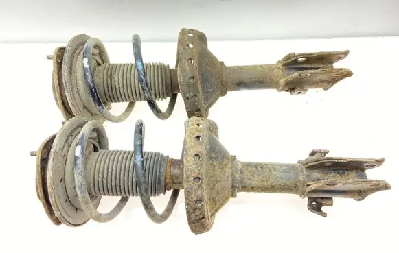 Subaru Legacy Front shock absorber with coil spring