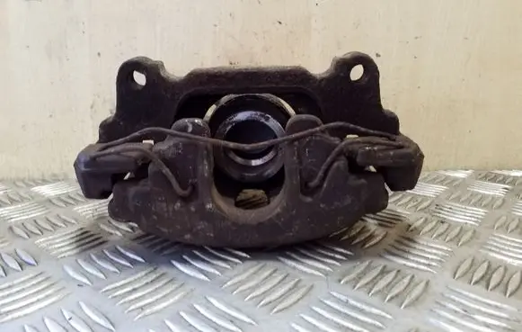 Volkswagen Golf VI Front brake caliper