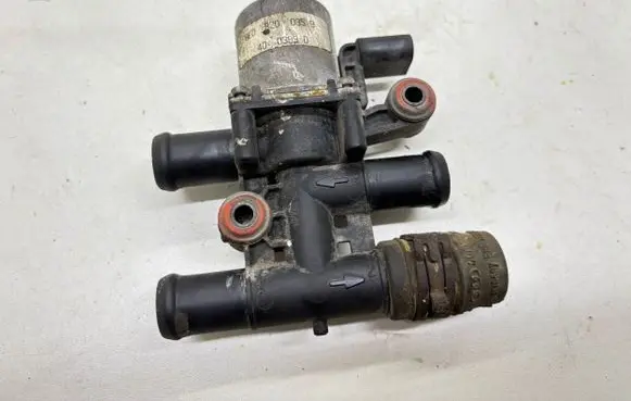 Coolant heater control valve