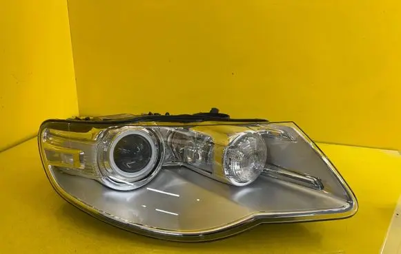 Volkswagen Touareg I Headlight/headlamp 7L6941040C
