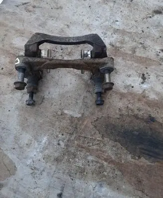 Subaru Outback Brake caliper pad carrier rear 