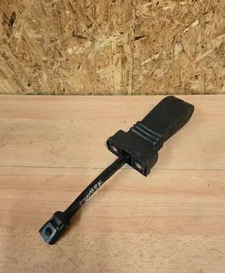 Front door check strap stopper