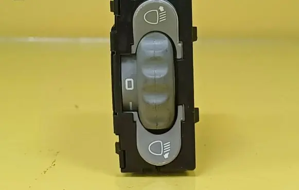 Headlight level height control switch