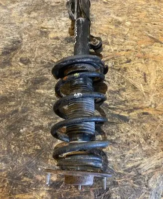Hyundai Santa Fe Front shock absorber with coil spring 546602B510