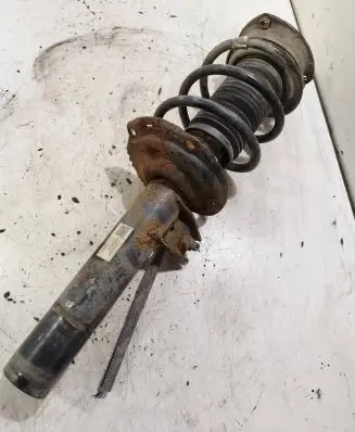 Front shock absorber with coil spring