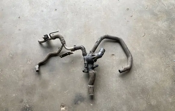 Thermostat/thermostat housing