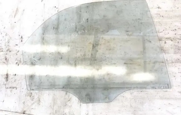 Mazda 121 Rear door window glass