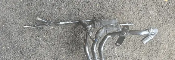 Volkswagen Golf VII Engine coolant pipe/hose 04L121064G