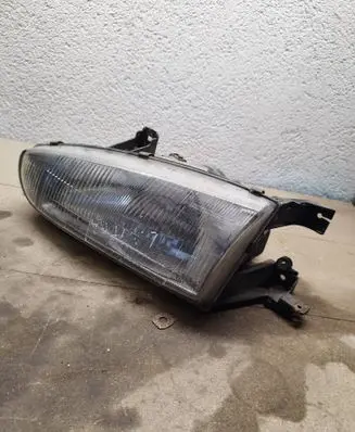 Hyundai Lantra I Headlight/headlamp E15203204 010051