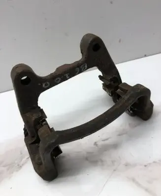 Volkswagen PASSAT B6 Brake caliper pad carrier rear 