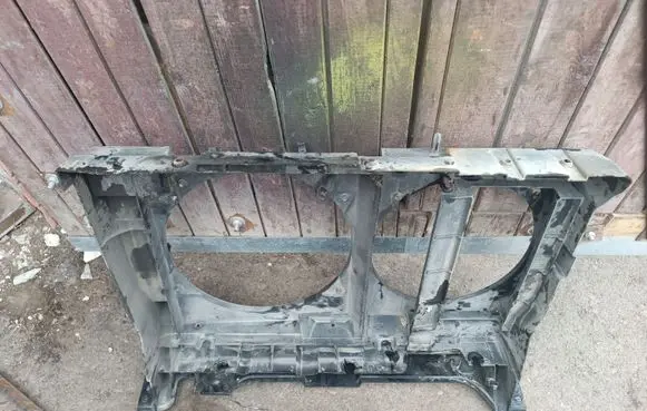 Radiator support slam panel