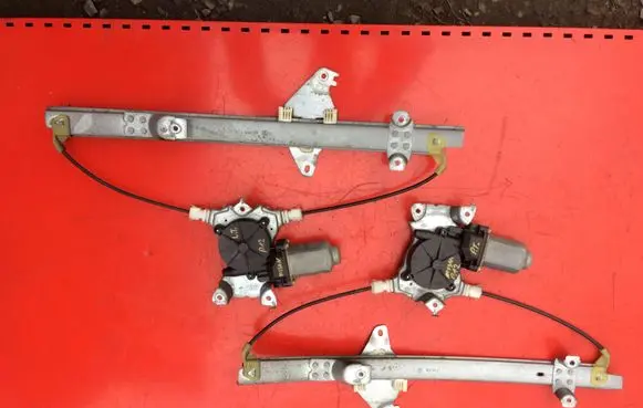 Nissan Primera Rear door window regulator with motor 400600T2