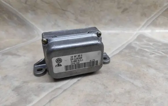 Volkswagen Caddy ESP acceleration yaw rate sensor 1K0907655B
