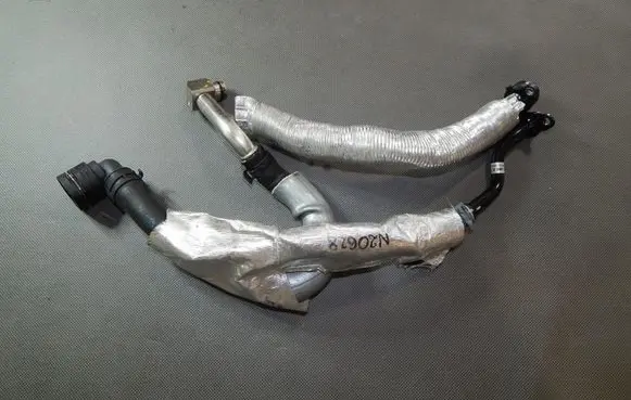 Skoda Kodiaq Engine coolant pipe/hose 06K121065R
