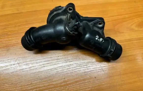 Thermostat/thermostat housing