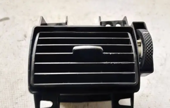 Dash center air vent grill