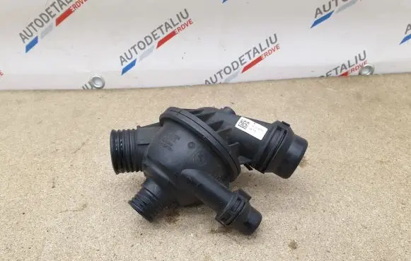 Thermostat/thermostat housing
