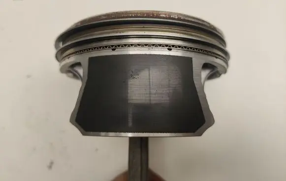 Piston with connecting rod