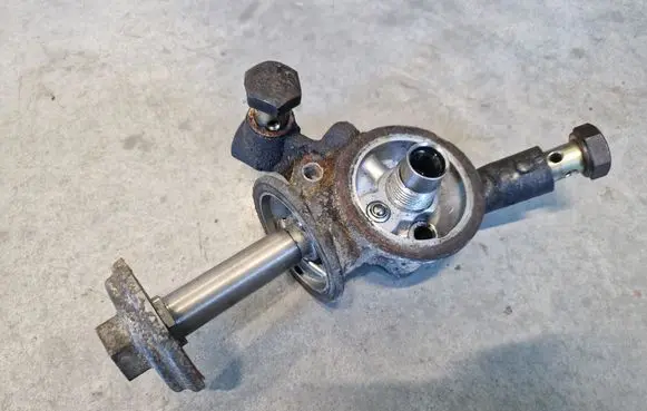 Nissan Patrol Y61 Oil filter mounting bracket 