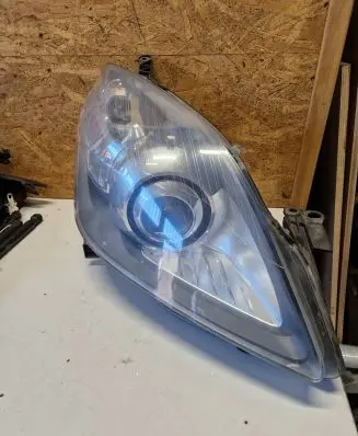 Opel Zafira B Headlight/headlamp 13252471 0301214282