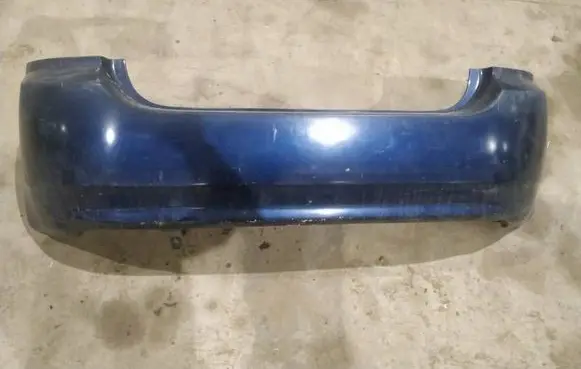 Toyota Corolla E120 E130 Rear bumper melynas